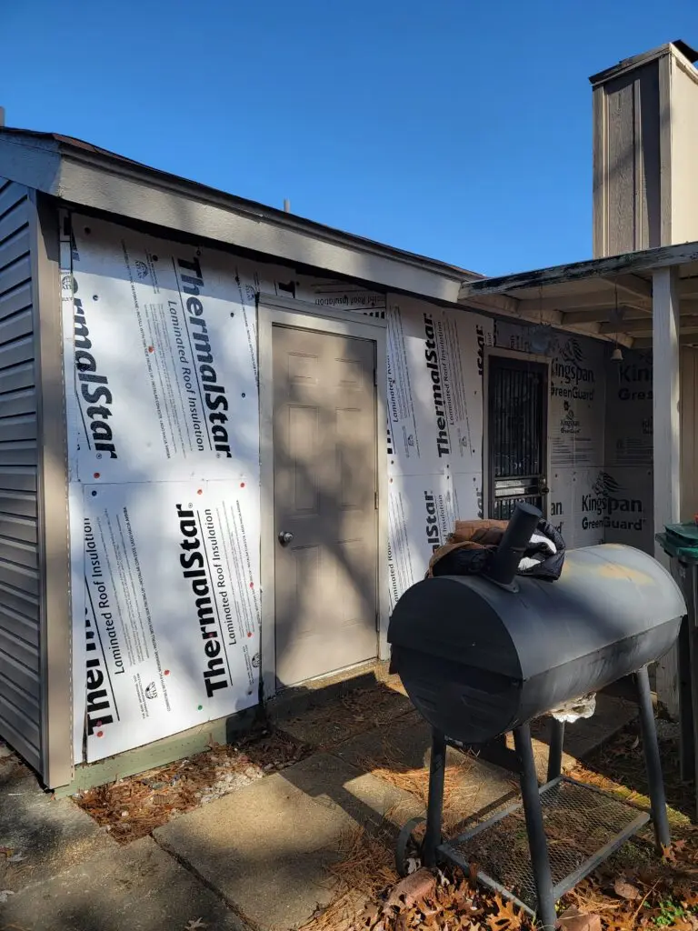 insulation installed for vinyl siding installation