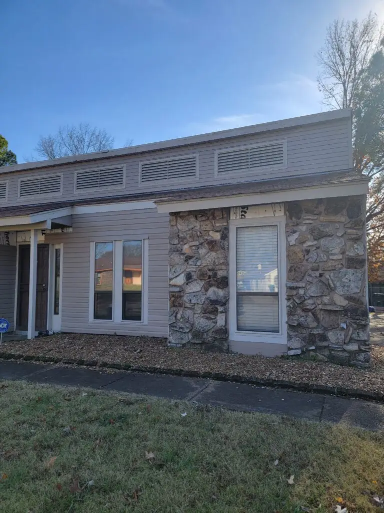 front of house after siding installation by No Limit Roofing