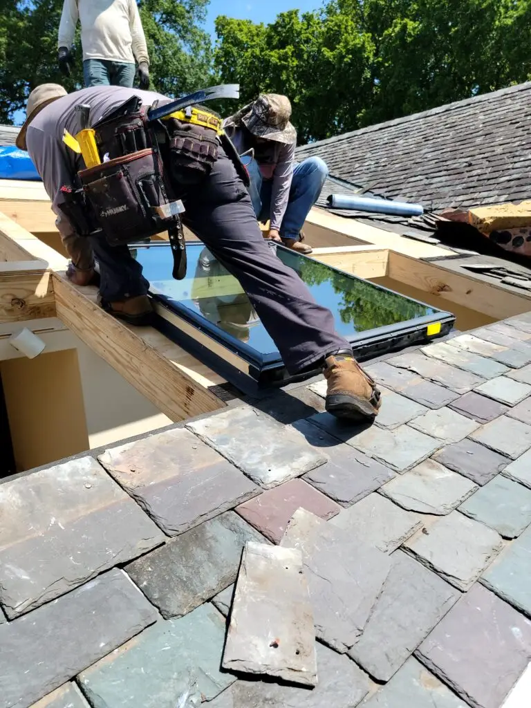 guys installing VELUX skylight